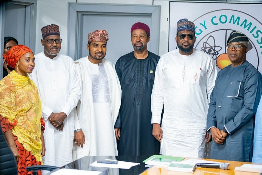 Energy Commission and NEMiC principals assembled after an engagement