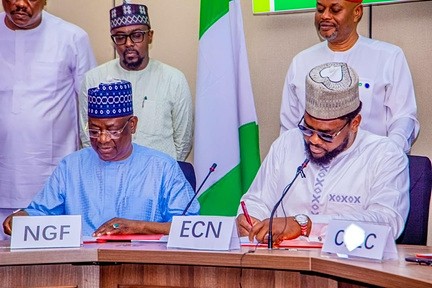 Signing ceremony with Nigeria Governors' Forum and Energy Commission placards